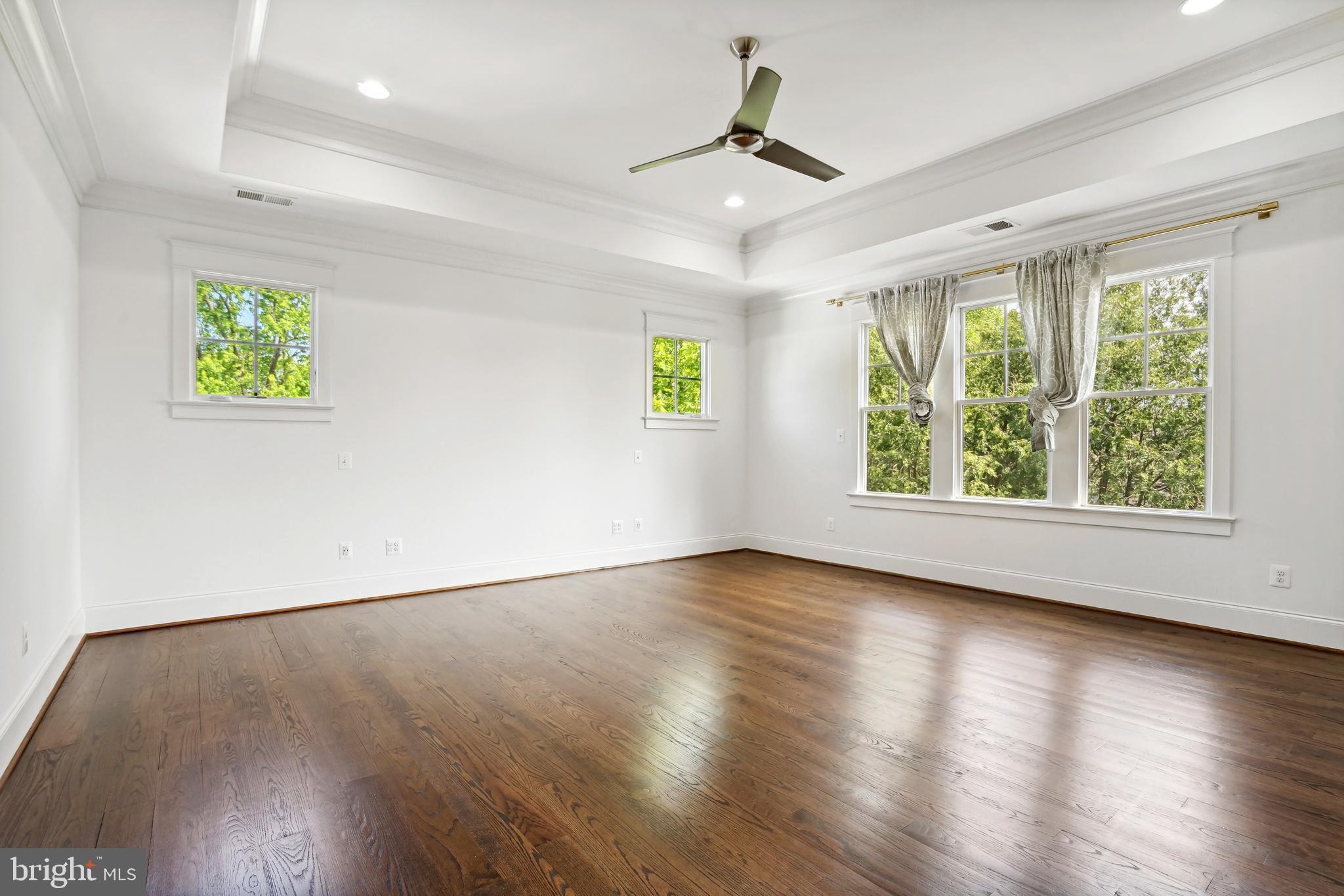 6719 Van Fleet Drive McLean, VA 22101 - Photo 11 of 29 a view of an empty room with window and wooden floor