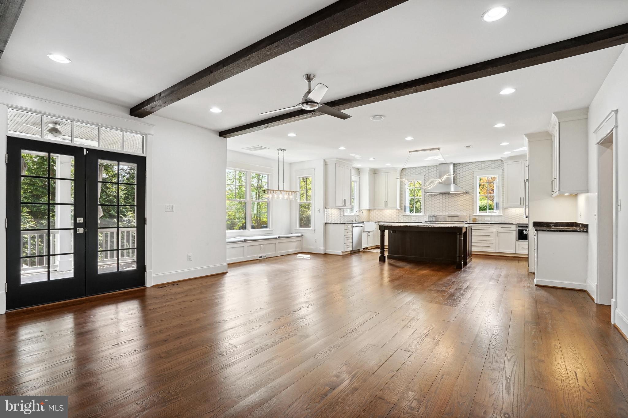 6719 Van Fleet Drive McLean, VA 22101 - Photo 15 of 29 a living room with stainless steel appliances kitchen island wooden floors and view living room