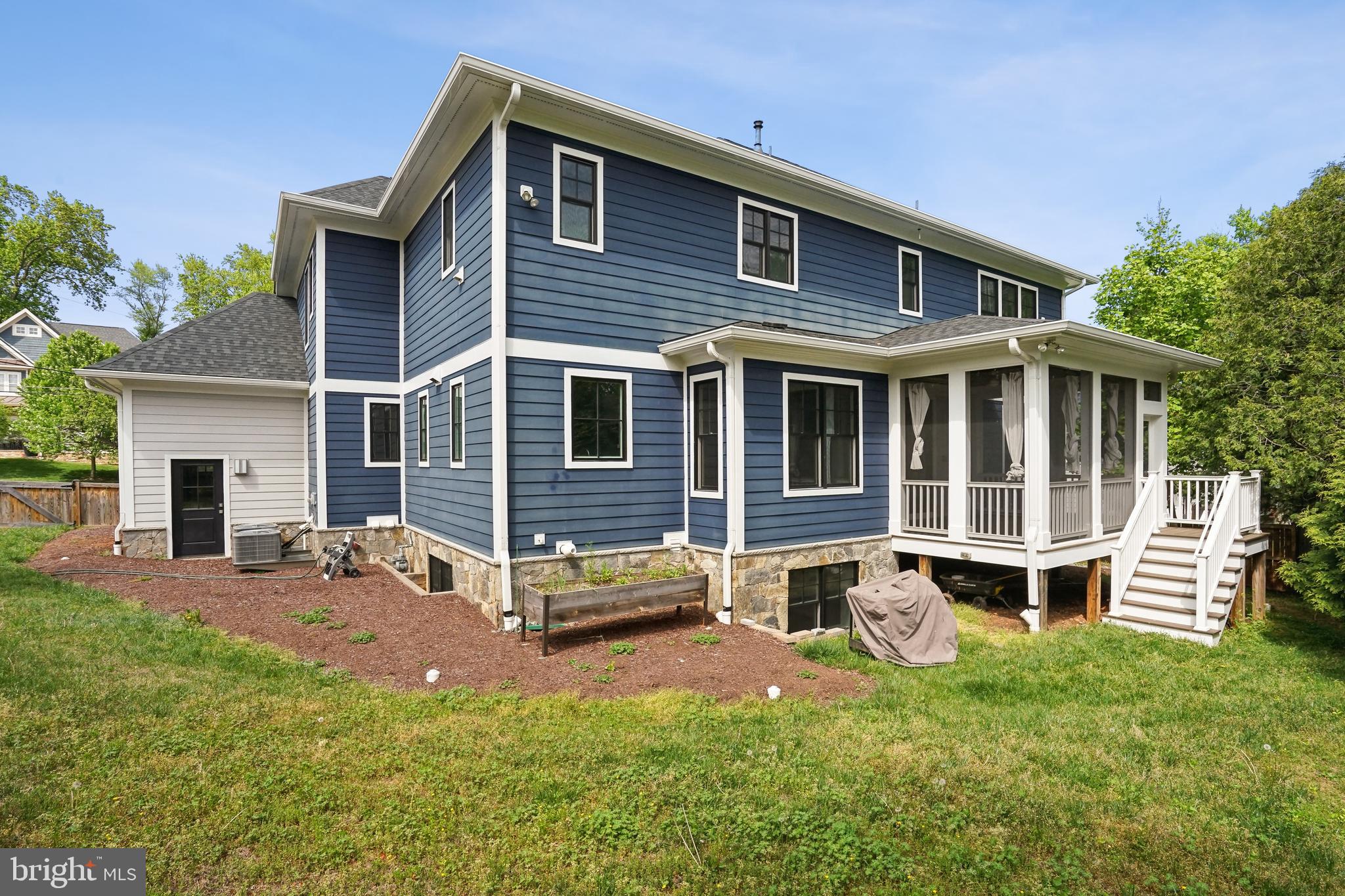 6719 Van Fleet Drive McLean, VA 22101 - Photo 28 of 29 a view of a house with a yard and sitting area