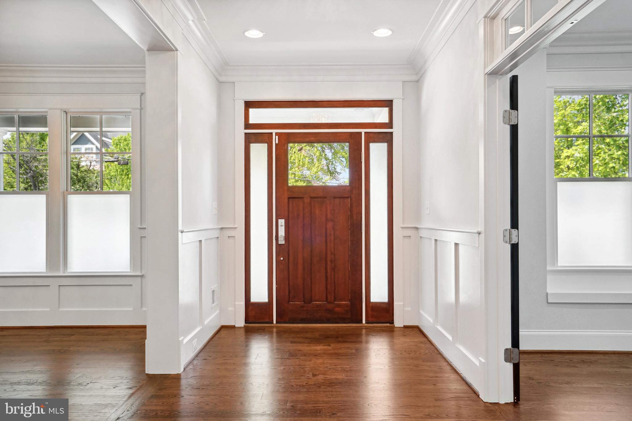 6719 Van Fleet Drive McLean, VA 22101 - Photo 3 of 29 an entryway with wooden floor and windows