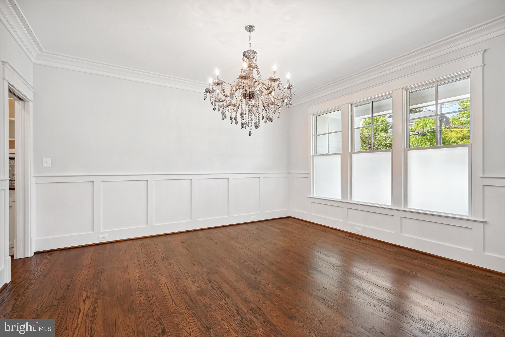 6719 Van Fleet Drive McLean, VA 22101 - Photo 9 of 29 a view of an empty room with wooden floor and a window