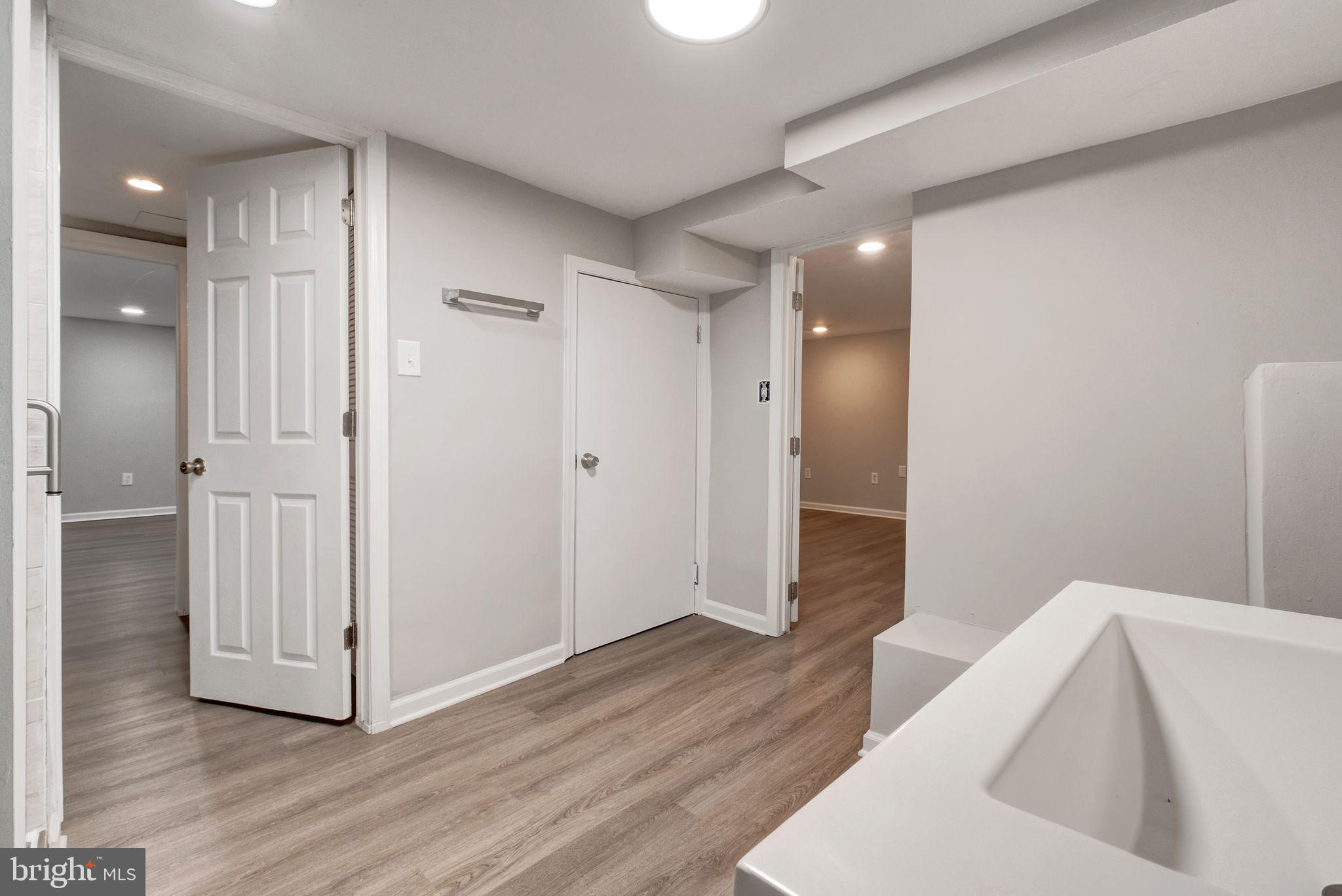 4829 Gilray Drive Baltimore, MD 21214 - Photo 19 of 28 a view of entryway with wooden floor