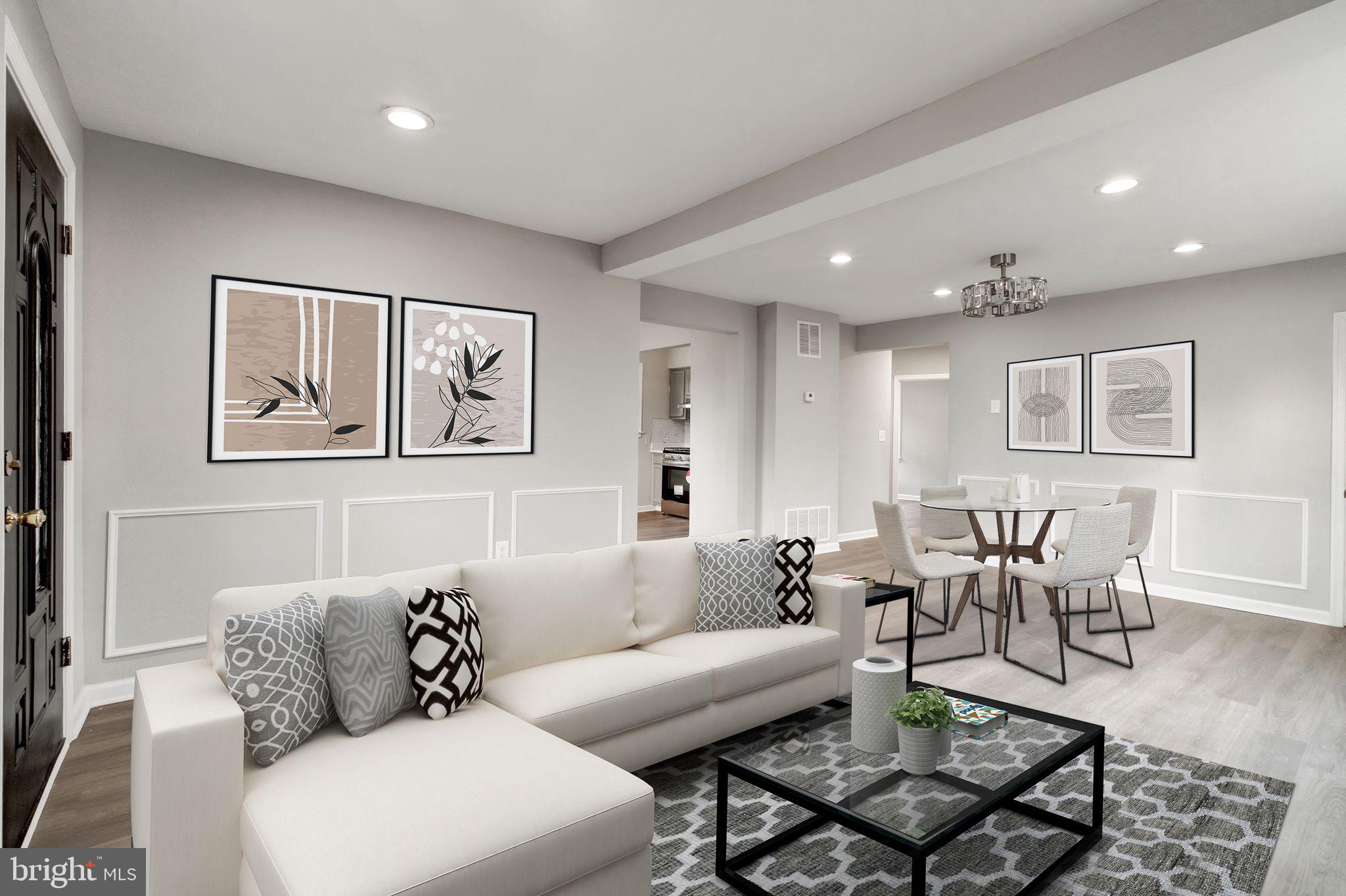 4829 Gilray Drive Baltimore, MD 21214 - Photo 2 of 28 a living room with furniture and wooden floor