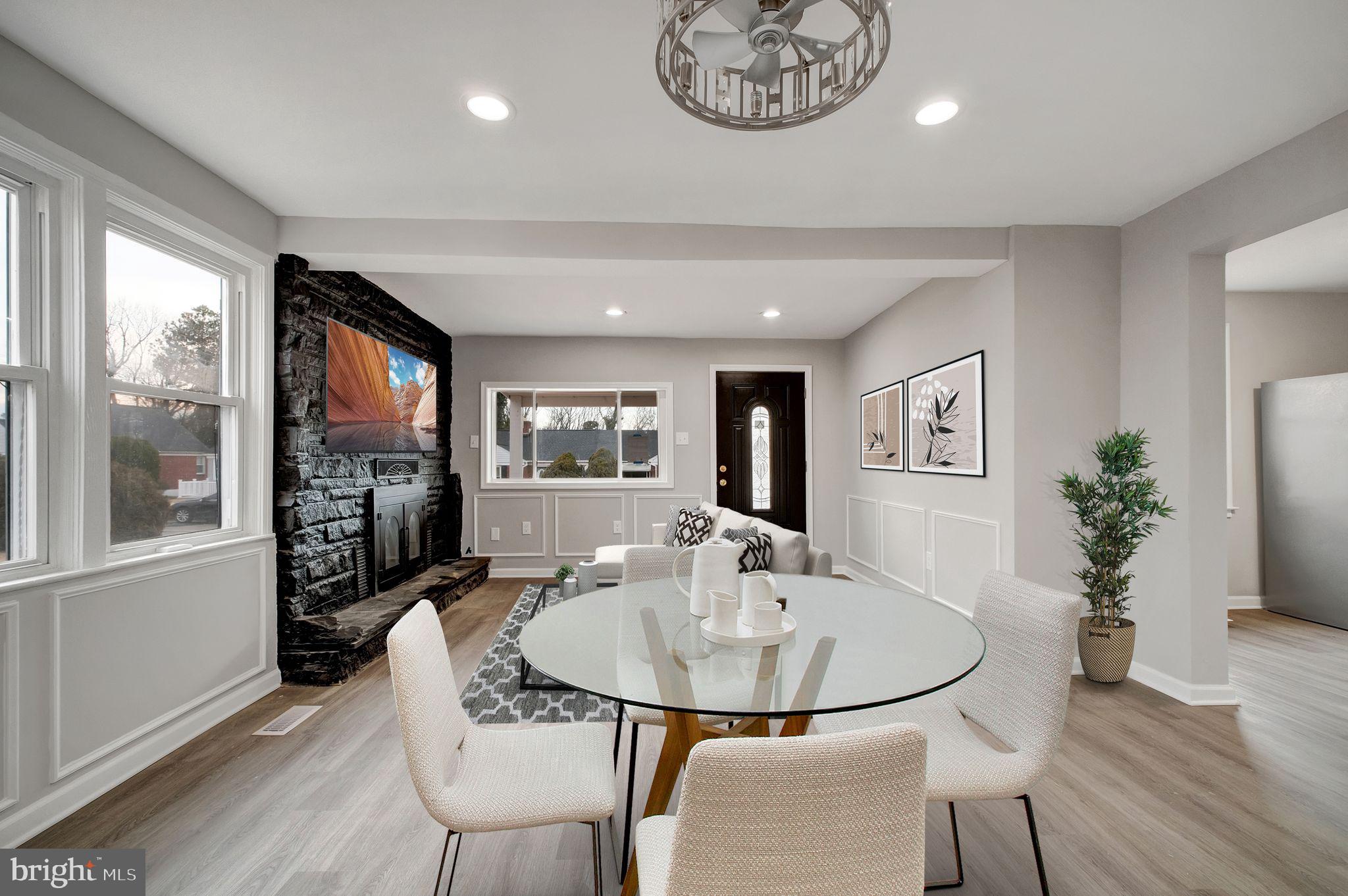 4829 Gilray Drive Baltimore, MD 21214 - Photo 4 of 28 a view of a dining room with furniture window and wooden floor