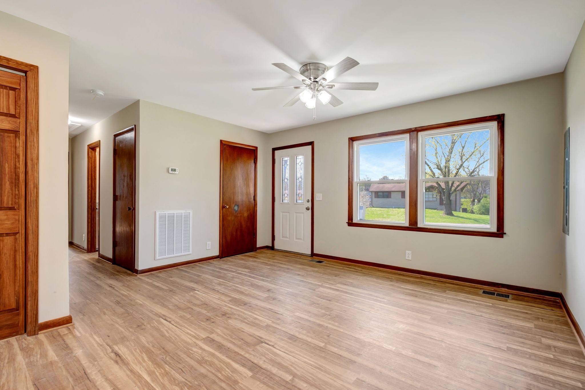 5010 Bonnameade Drive Hermitage, TN 37076 - Photo 13 of 27 a view of an empty room with window and wooden floor