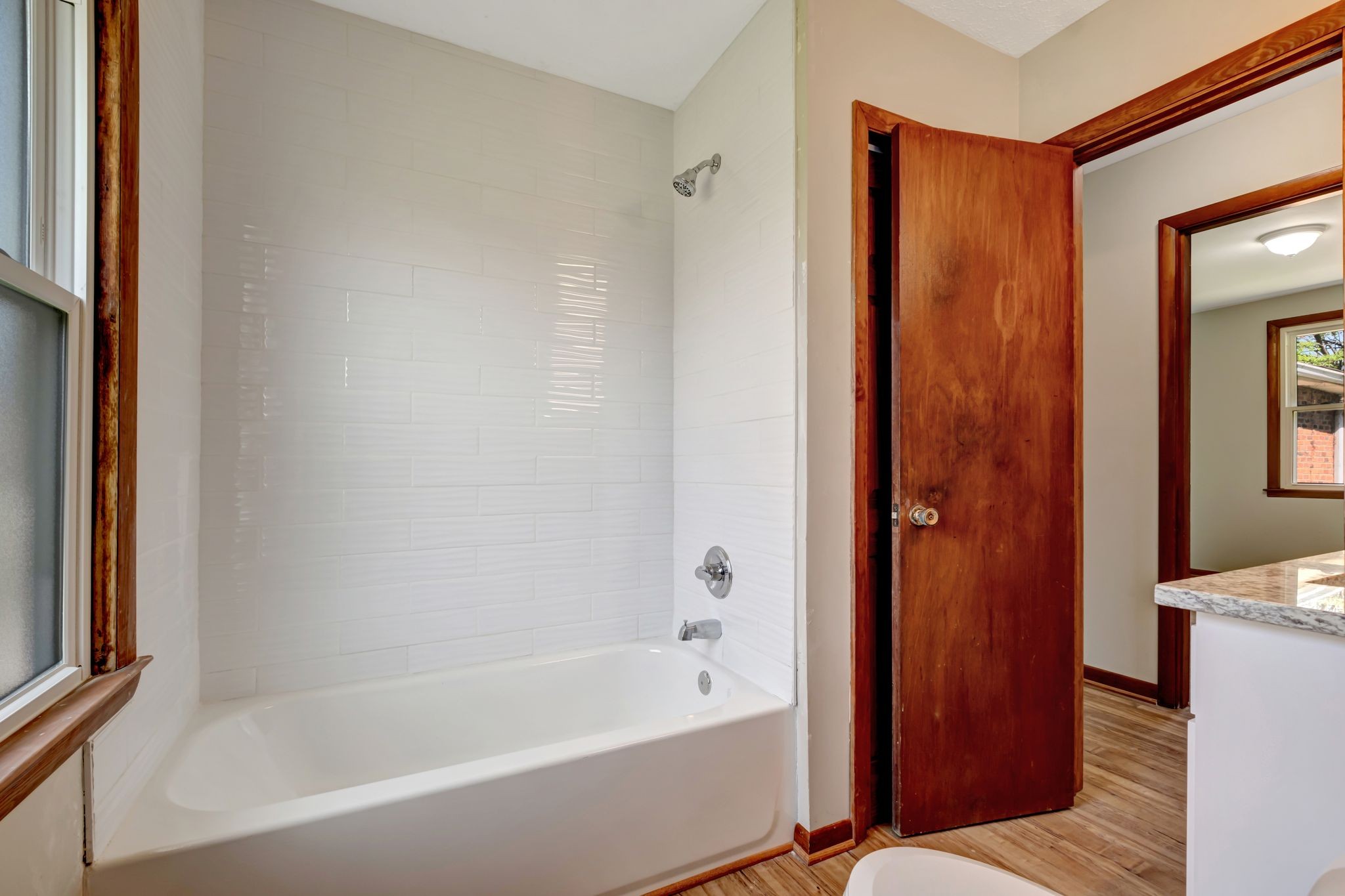 5010 Bonnameade Drive Hermitage, TN 37076 - Photo 20 of 27 a bathroom with a bathtub and shower