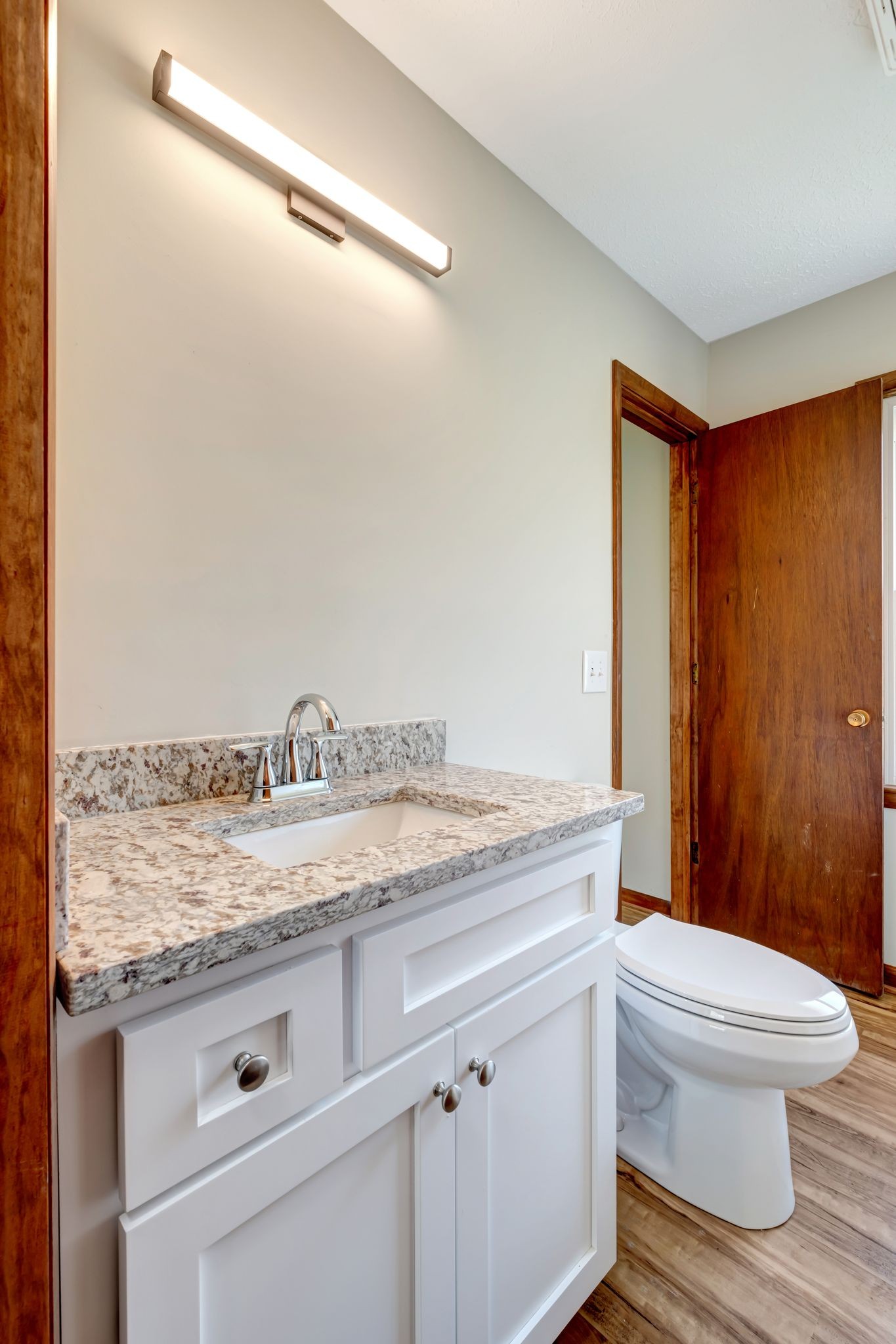 5010 Bonnameade Drive Hermitage, TN 37076 - Photo 21 of 27 a bathroom with a granite countertop sink toilet and shower