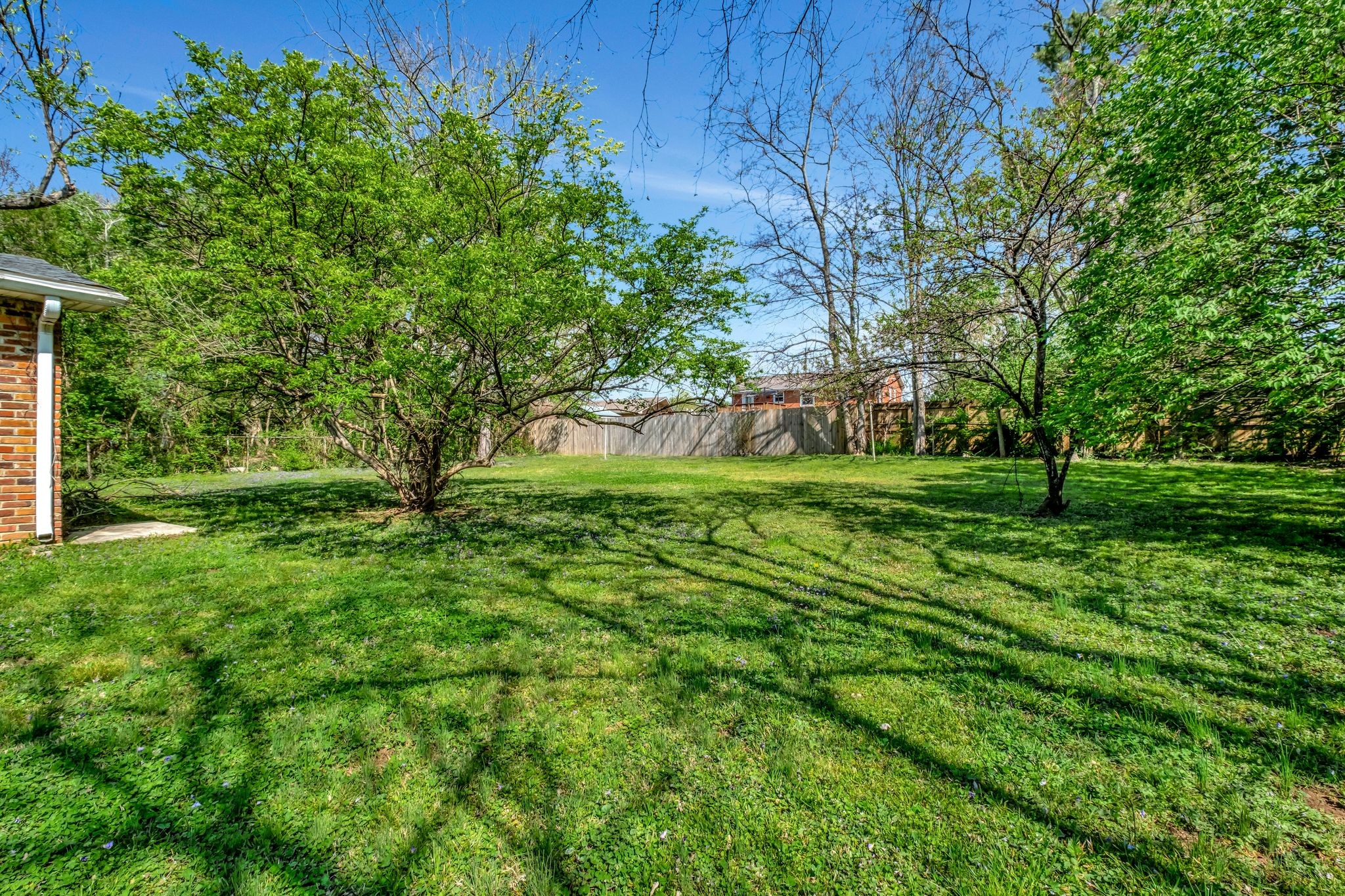 5010 Bonnameade Drive Hermitage, TN 37076 - Photo 25 of 27 a backyard of a house with lots of green space