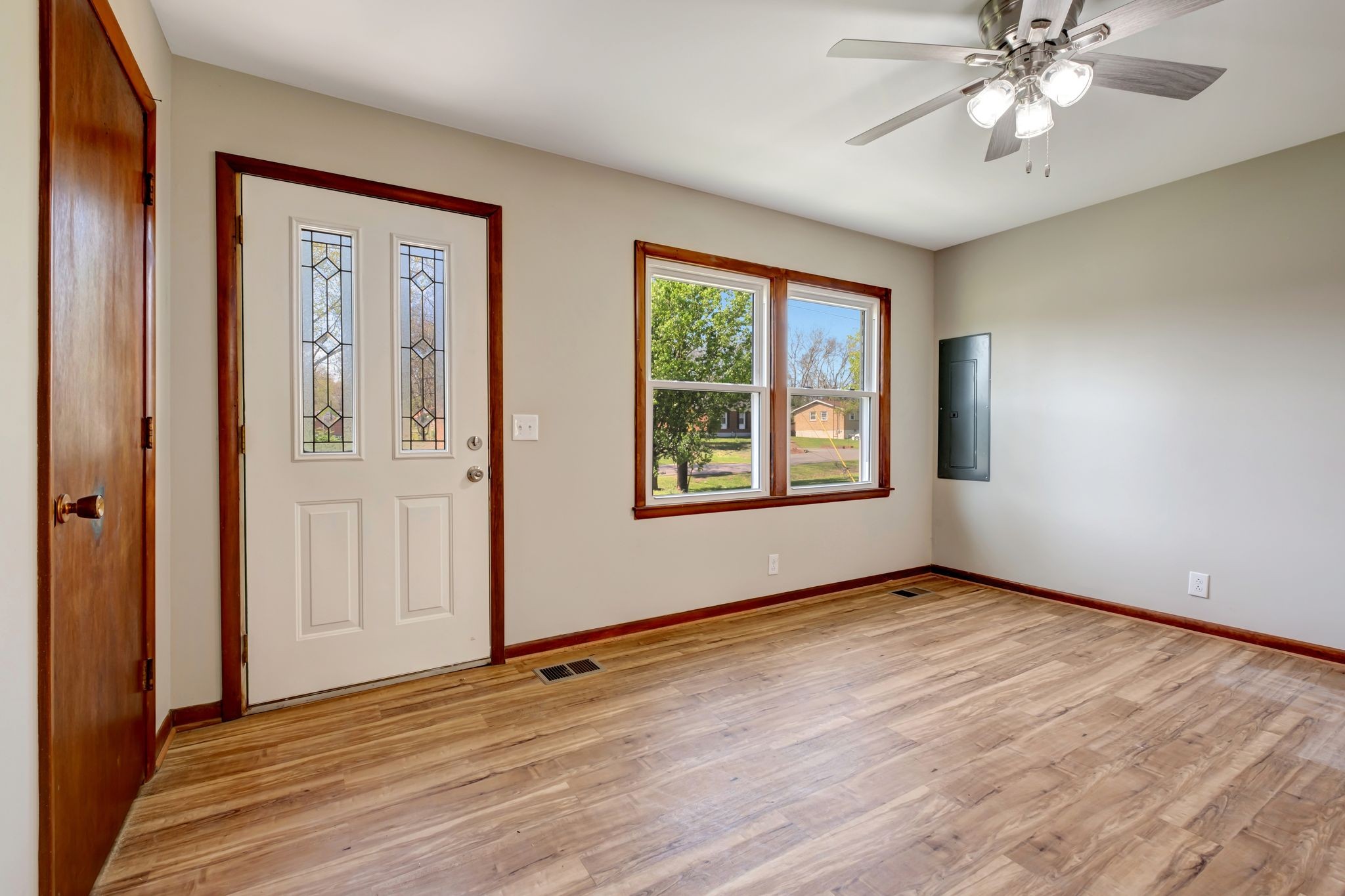 5010 Bonnameade Drive Hermitage, TN 37076 - Photo 7 of 27 a view of an empty room with window and wooden floor