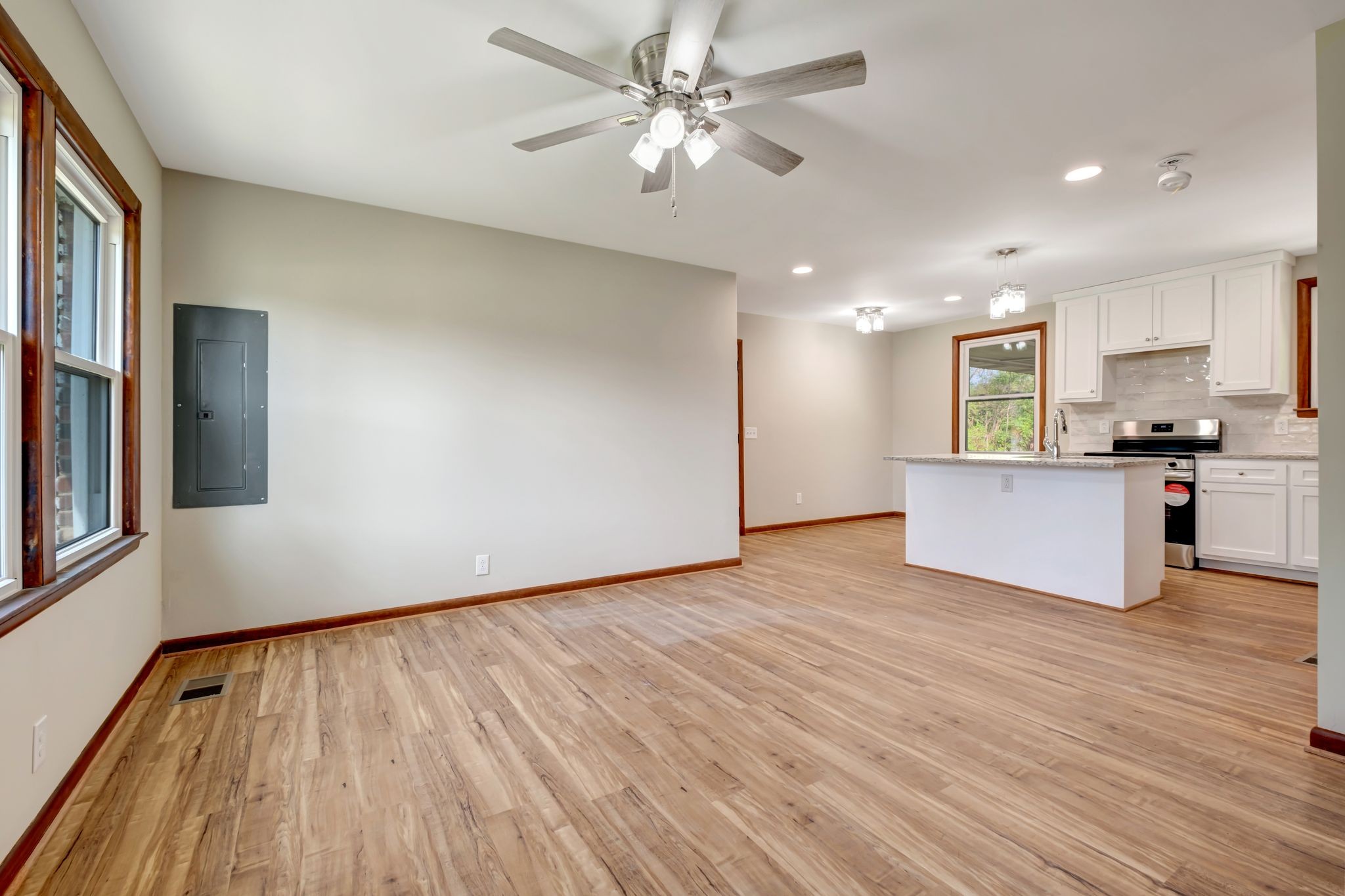5010 Bonnameade Drive Hermitage, TN 37076 - Photo 8 of 27 a view of a kitchen with a dishwasher cabinets and a wooden floor