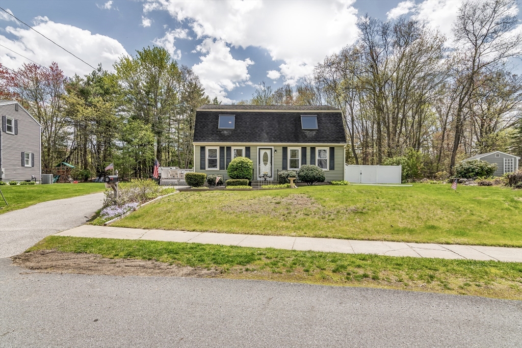 8 Portsmouth Road Amesbury, MA 01913 - Photo 2 of 37 a front view of house with yard and green space
