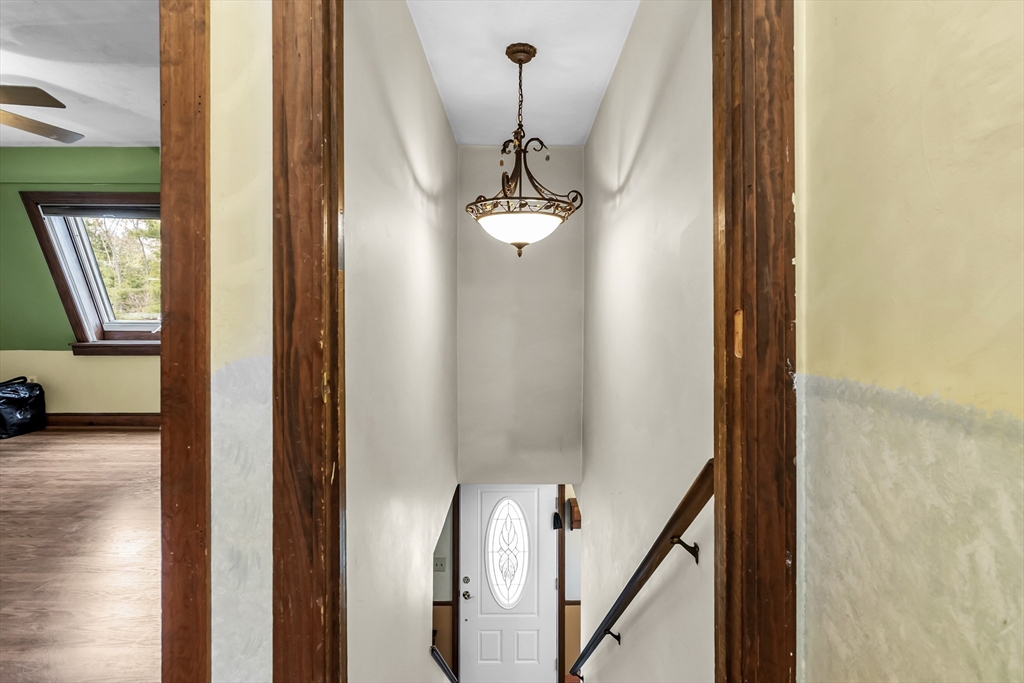 8 Portsmouth Road Amesbury, MA 01913 - Photo 25 of 37 a view of a hallway with a dining room view