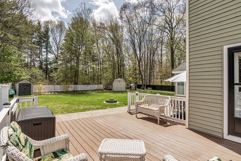 8 Portsmouth Road Amesbury, MA 01913 - Photo 34 of 37 a view of backyard with barbeque grill and outdoor seating