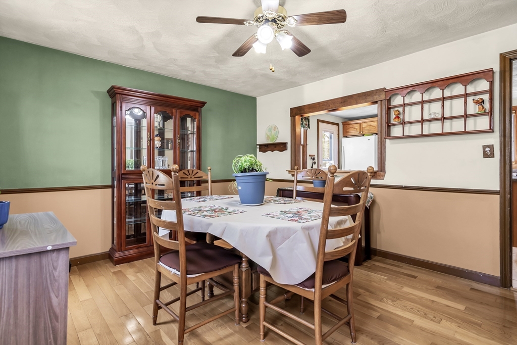 8 Portsmouth Road Amesbury, MA 01913 - Photo 7 of 37 a view of a dining room with furniture window and wooden floor