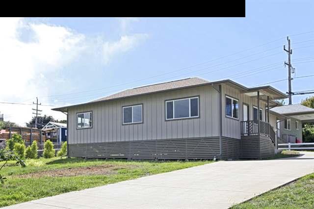 15 Maha Road, Unit 12 Makawao, HI 96768 - Photo 10 of 10 a front view of a house with a garden and yard