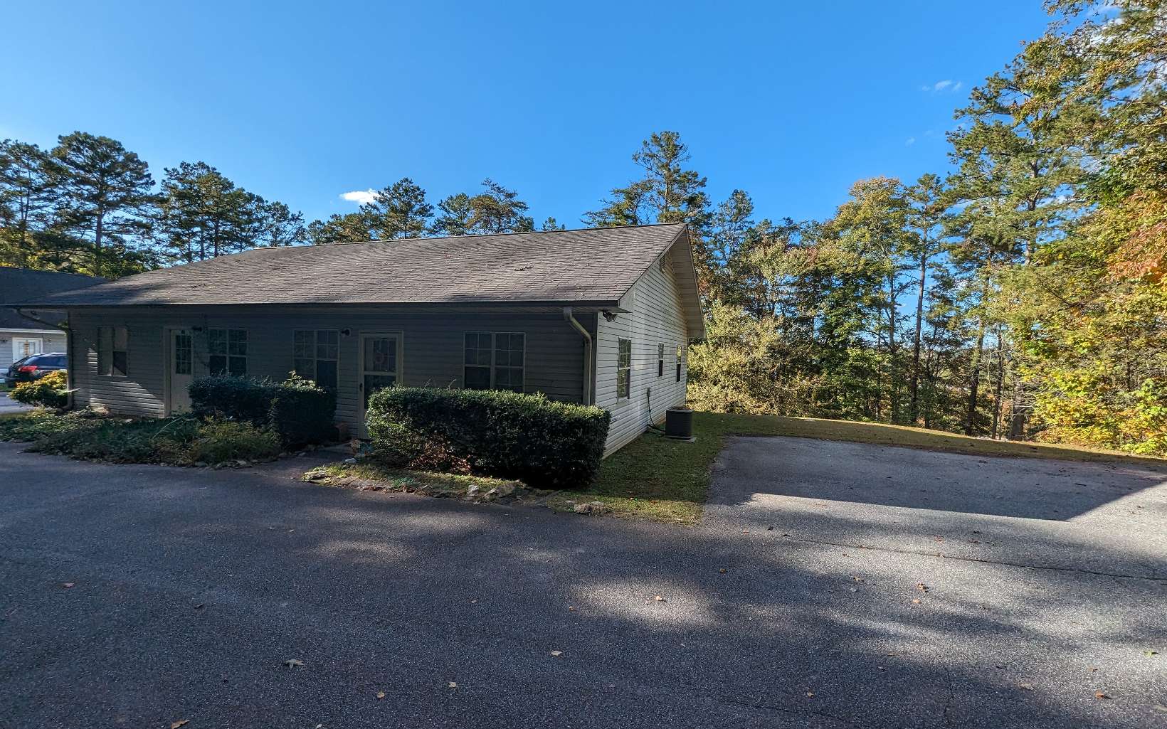 Hill Top Lane Blue Ridge, GA 30513 - Photo 6 of 8 a front view of a house with a yard and potted plants