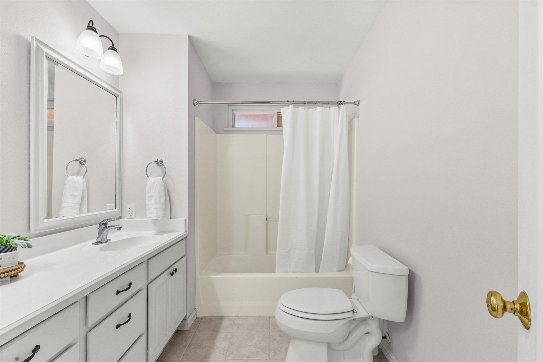 10860 County Road 272 Somerville, TX 77879 - Photo 18 of 34 a bathroom with a double vanity sink toilet and shower