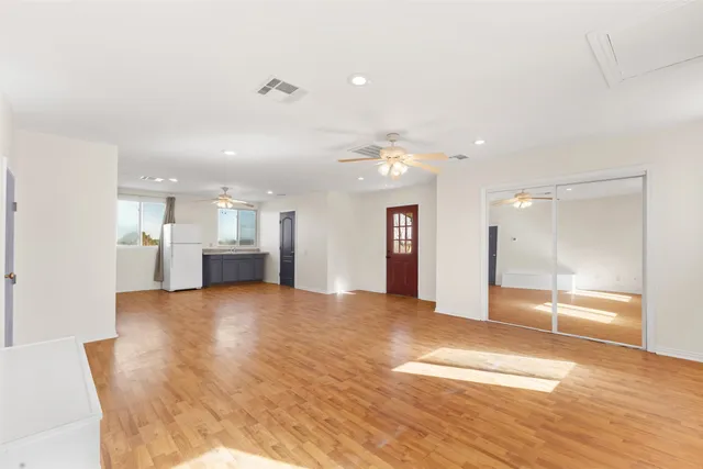 a view of a kitchen and a window