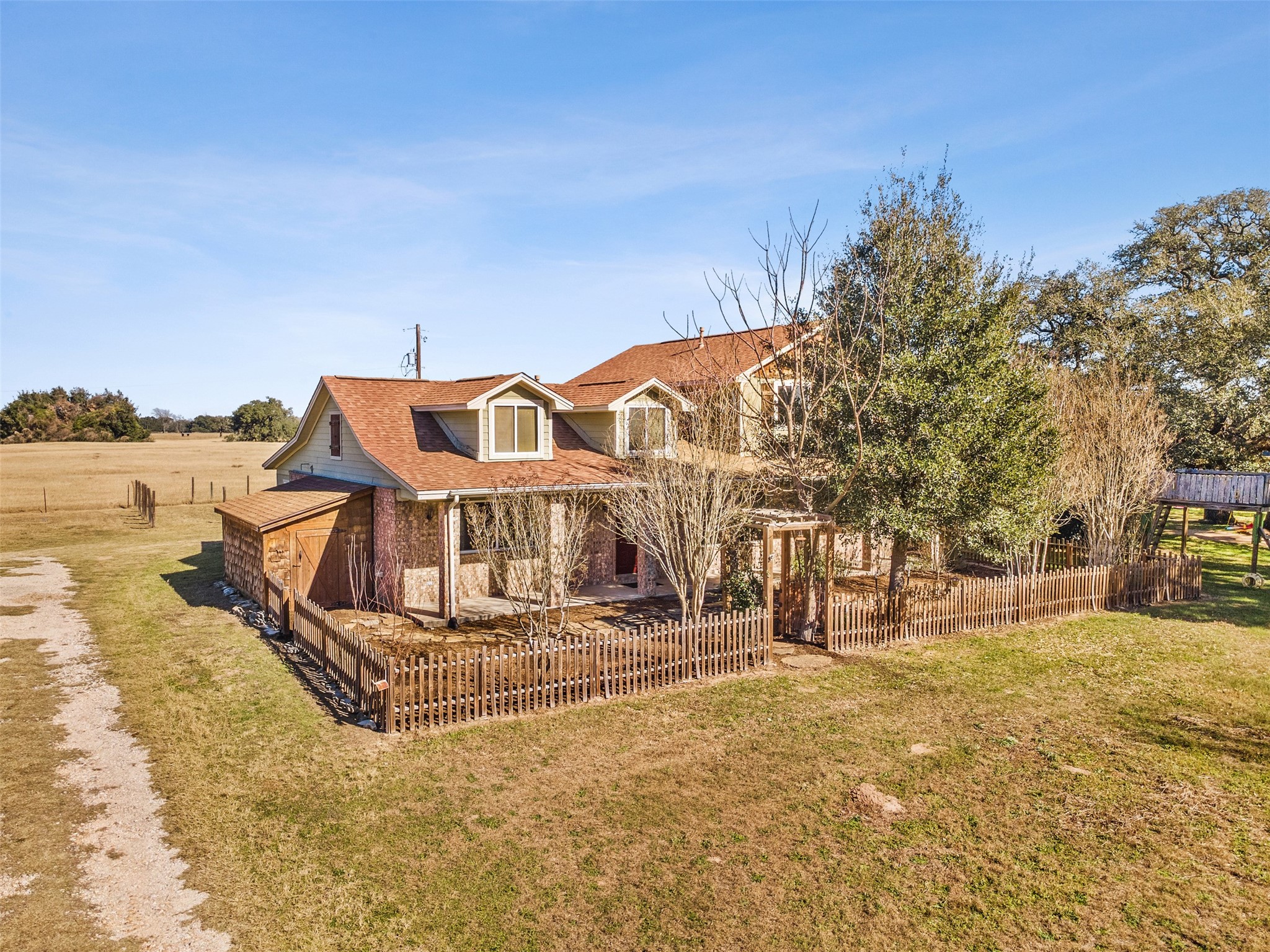 10860 County Road 272 Somerville, TX 77879 - Photo 32 of 34 a view of a house with a yard