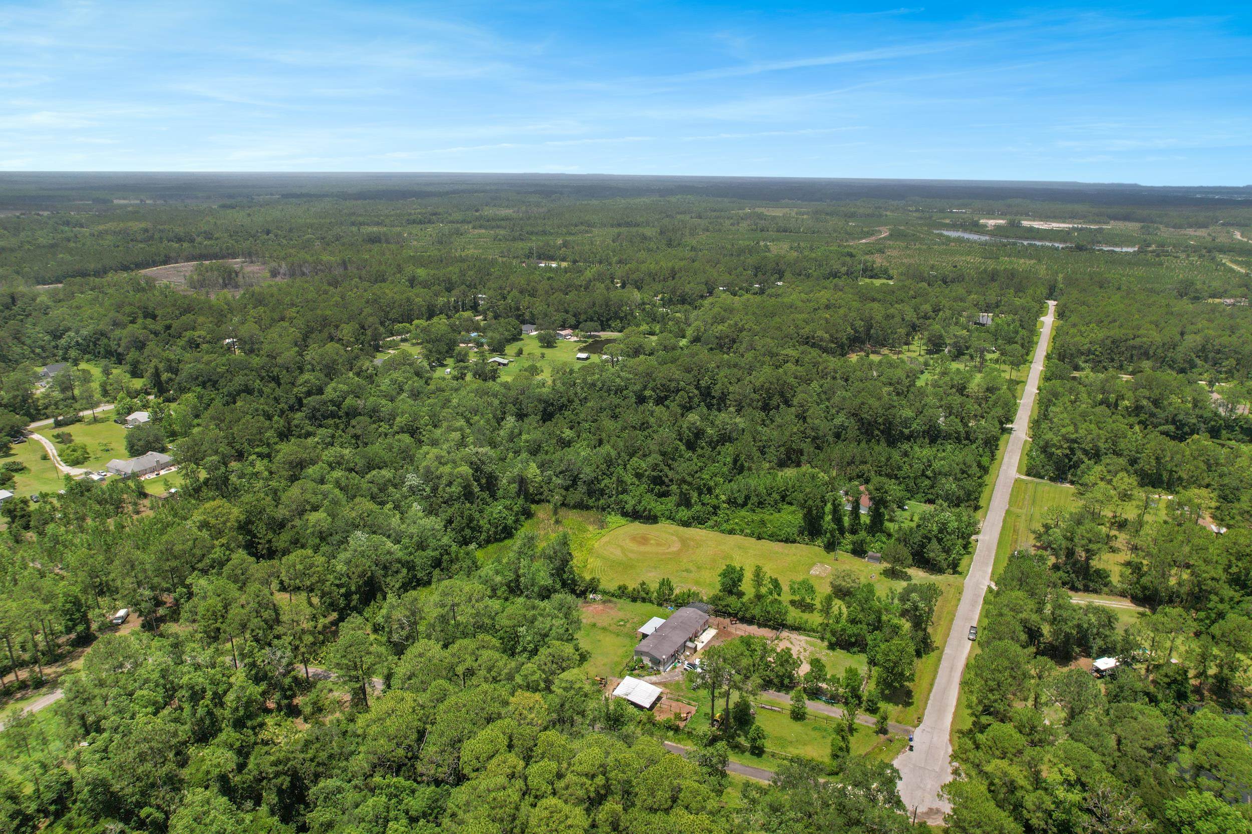 1981 Isherwood Terrace St. Augustine, FL 32092 - Photo 17 of 21 a view of a lake with a city