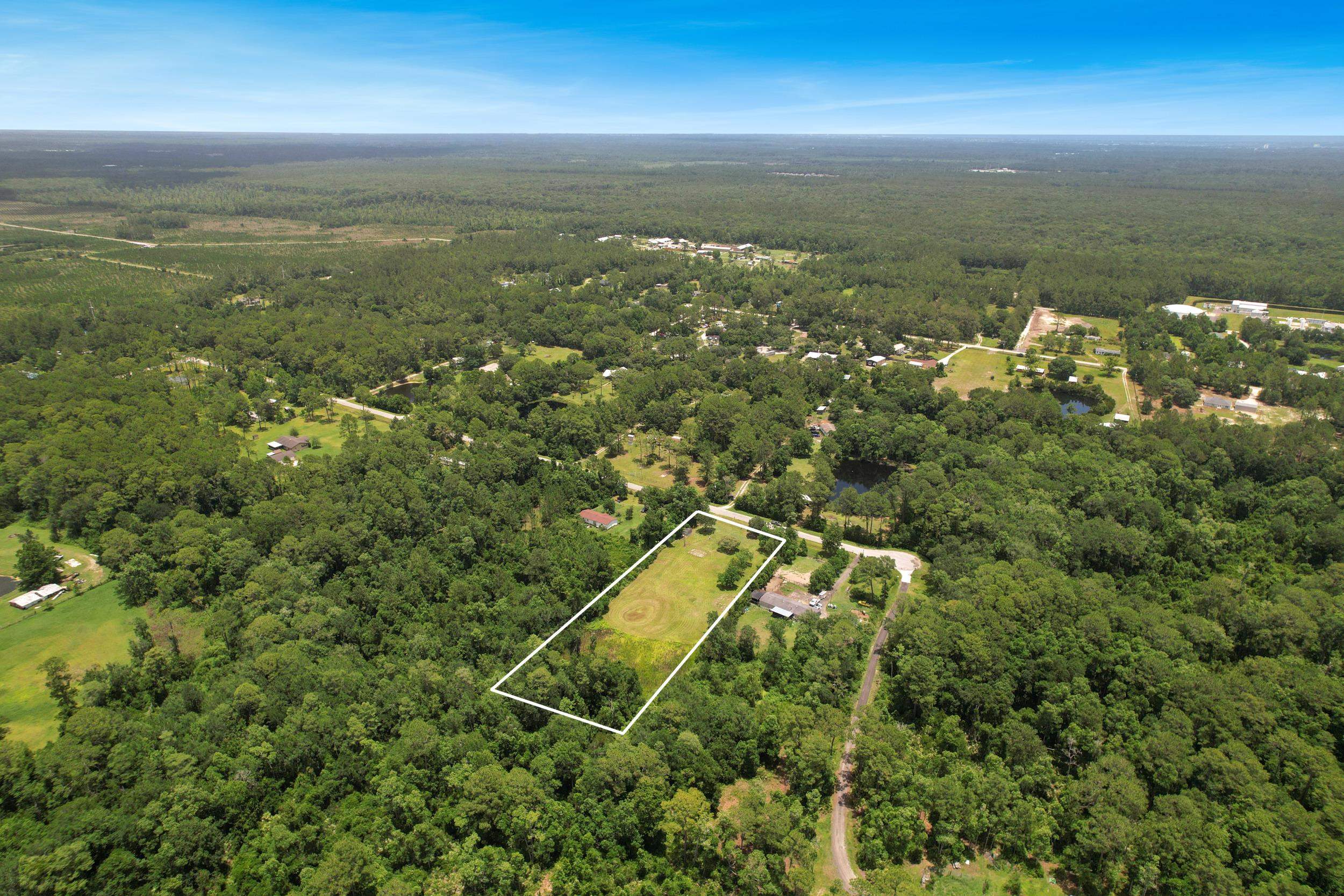 1981 Isherwood Terrace St. Augustine, FL 32092 - Photo 4 of 21 an aerial view of residential houses with outdoor space