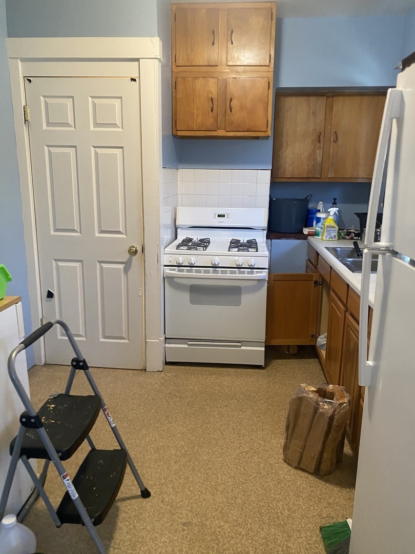 414 Hovey Avenue Normal, IL 61761 - Photo 5 of 9 a room with storage and utility