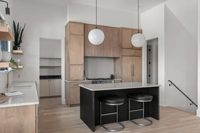 a bathroom with a shower curtain and a sink