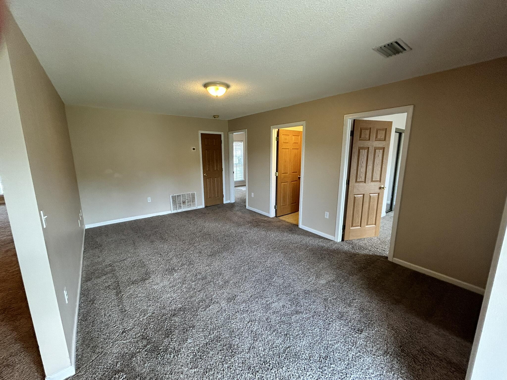 2175 Hagood Loop Crestview, FL 32536 - Photo 5 of 15 an empty room with windows