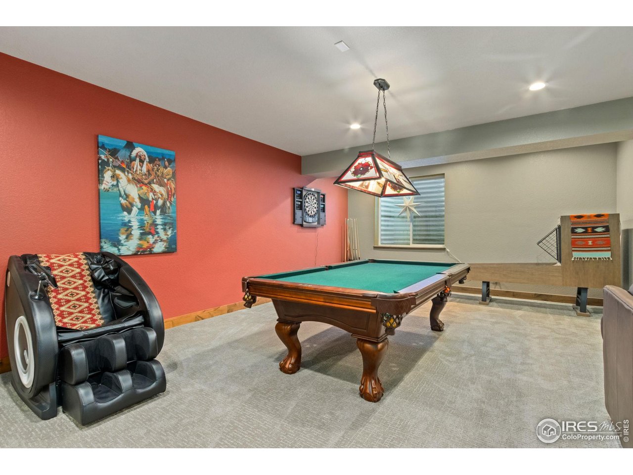 7982 Rising Sun Court Windsor, CO 80550 - Photo 30 of 48 a room with furniture pool table and a window