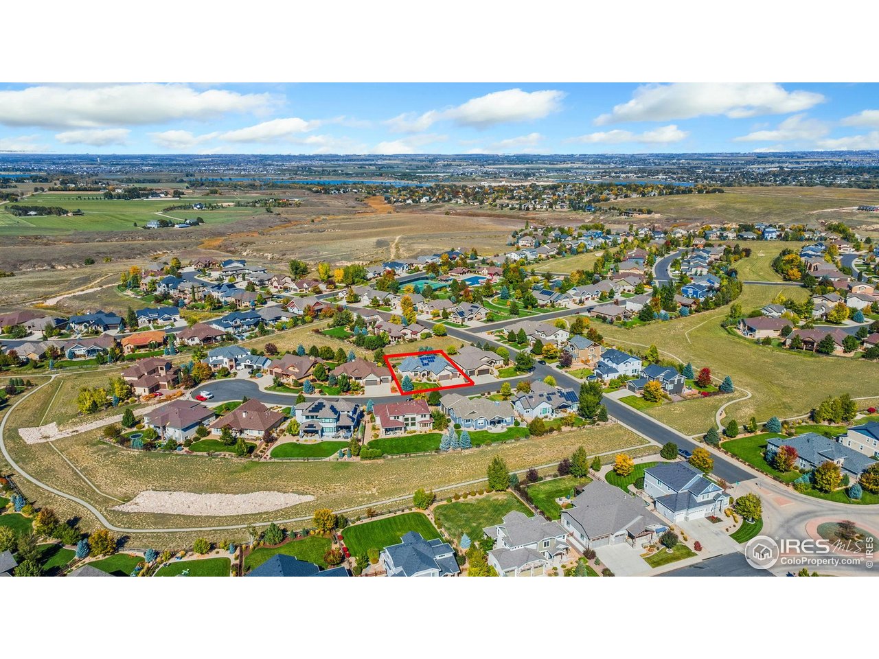 7982 Rising Sun Court Windsor, CO 80550 - Photo 3 of 48 a view of a city with an ocean