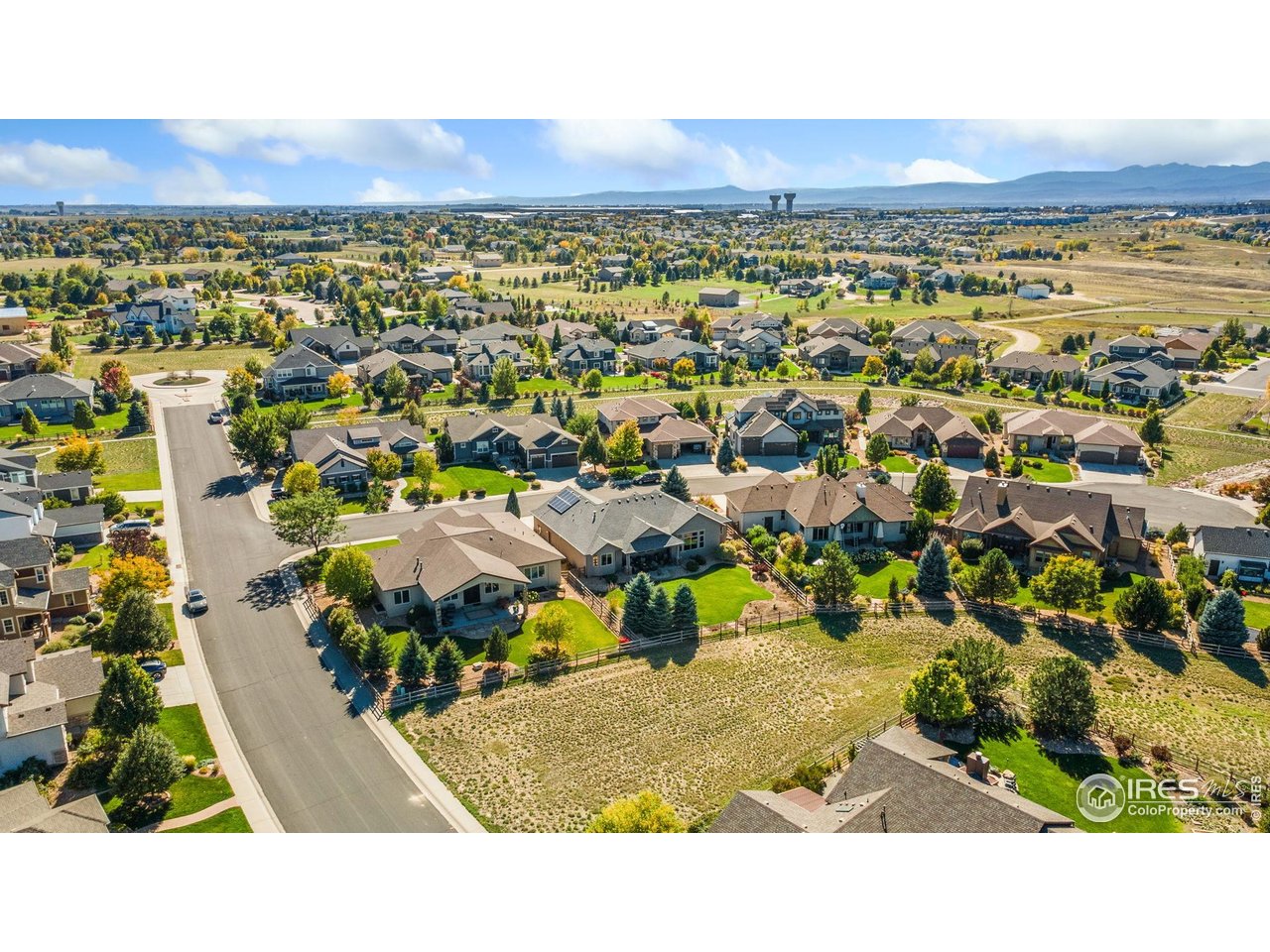 7982 Rising Sun Court Windsor, CO 80550 - Photo 44 of 48 an aerial view of residential houses with outdoor space and trees