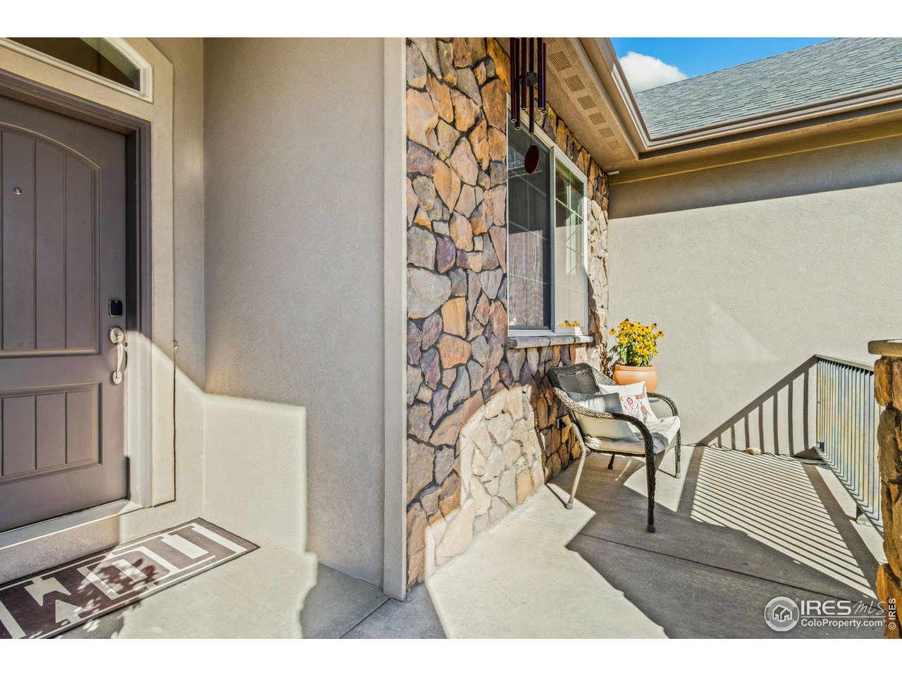 7982 Rising Sun Court Windsor, CO 80550 - Photo 6 of 48 a view of a furniture and wooden floor