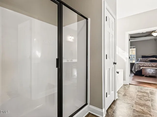 a view of a livingroom and a bathroom