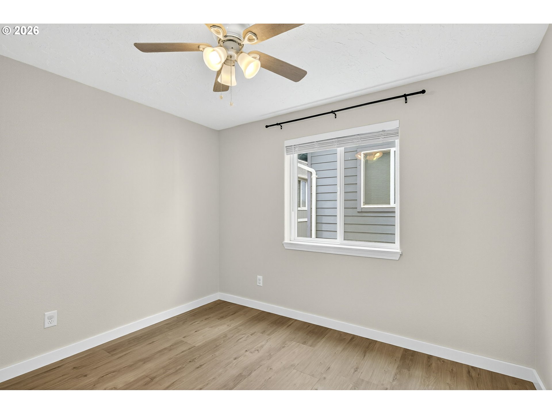 929 Northwest Spring Street Newport, OR 97365 - Photo 29 of 46 a view of an empty room with a window