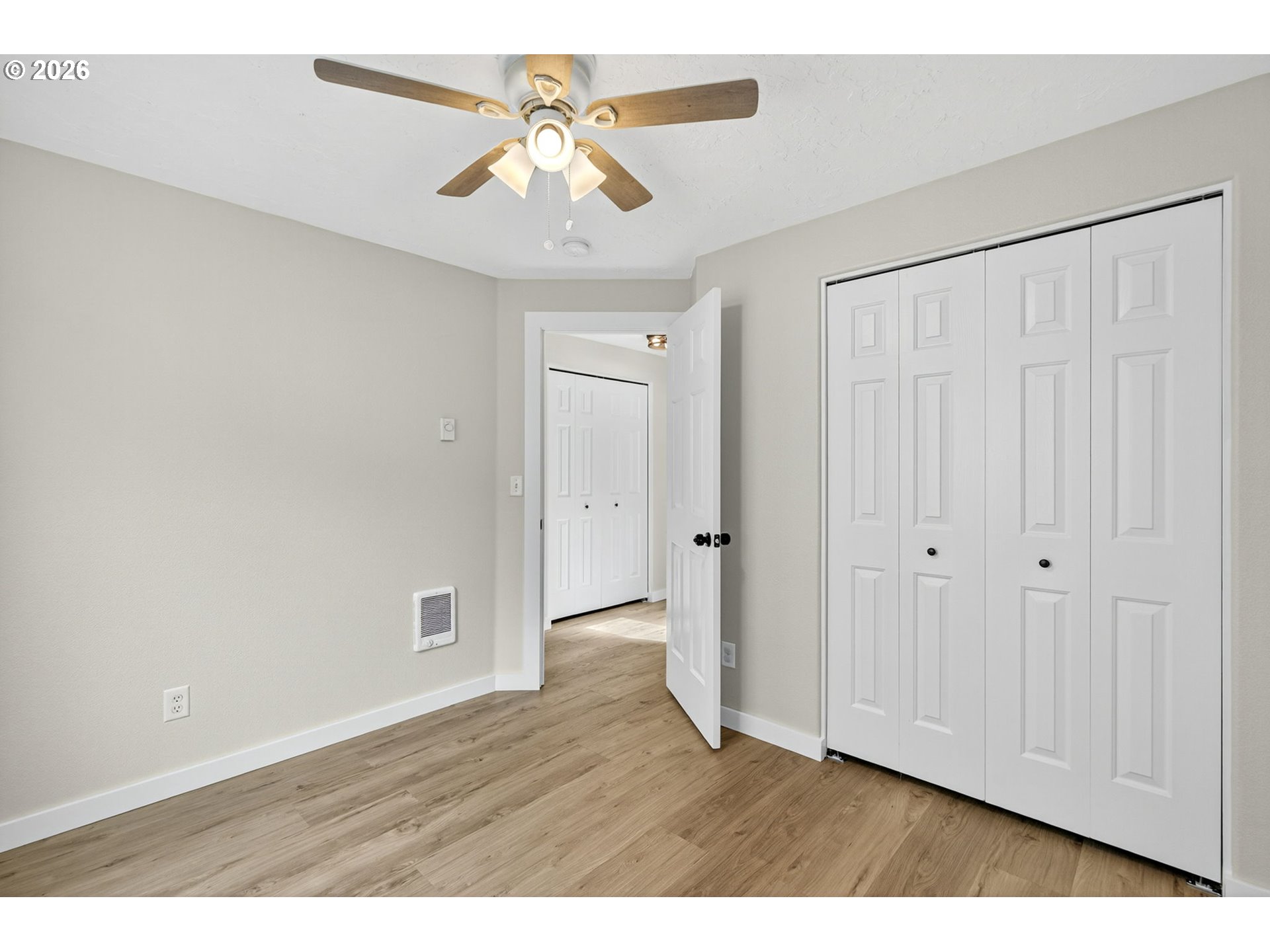 929 Northwest Spring Street Newport, OR 97365 - Photo 31 of 46 a view of an empty room with a window
