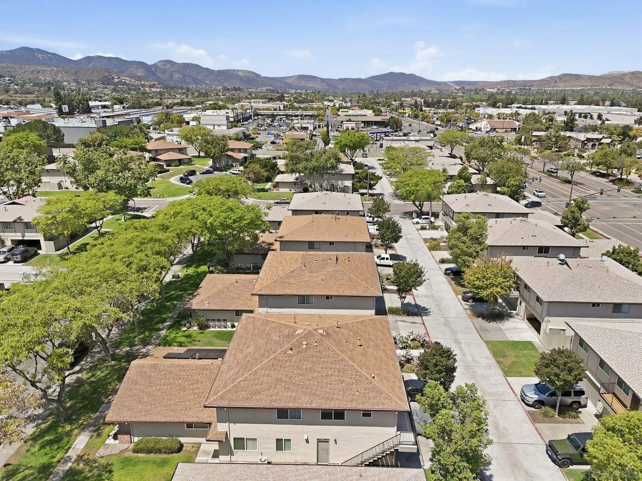 9926 Mission Vega Road, Unit 4 Santee, CA 92071 - Photo 30 of 30 an aerial view of residential houses with outdoor space and trees