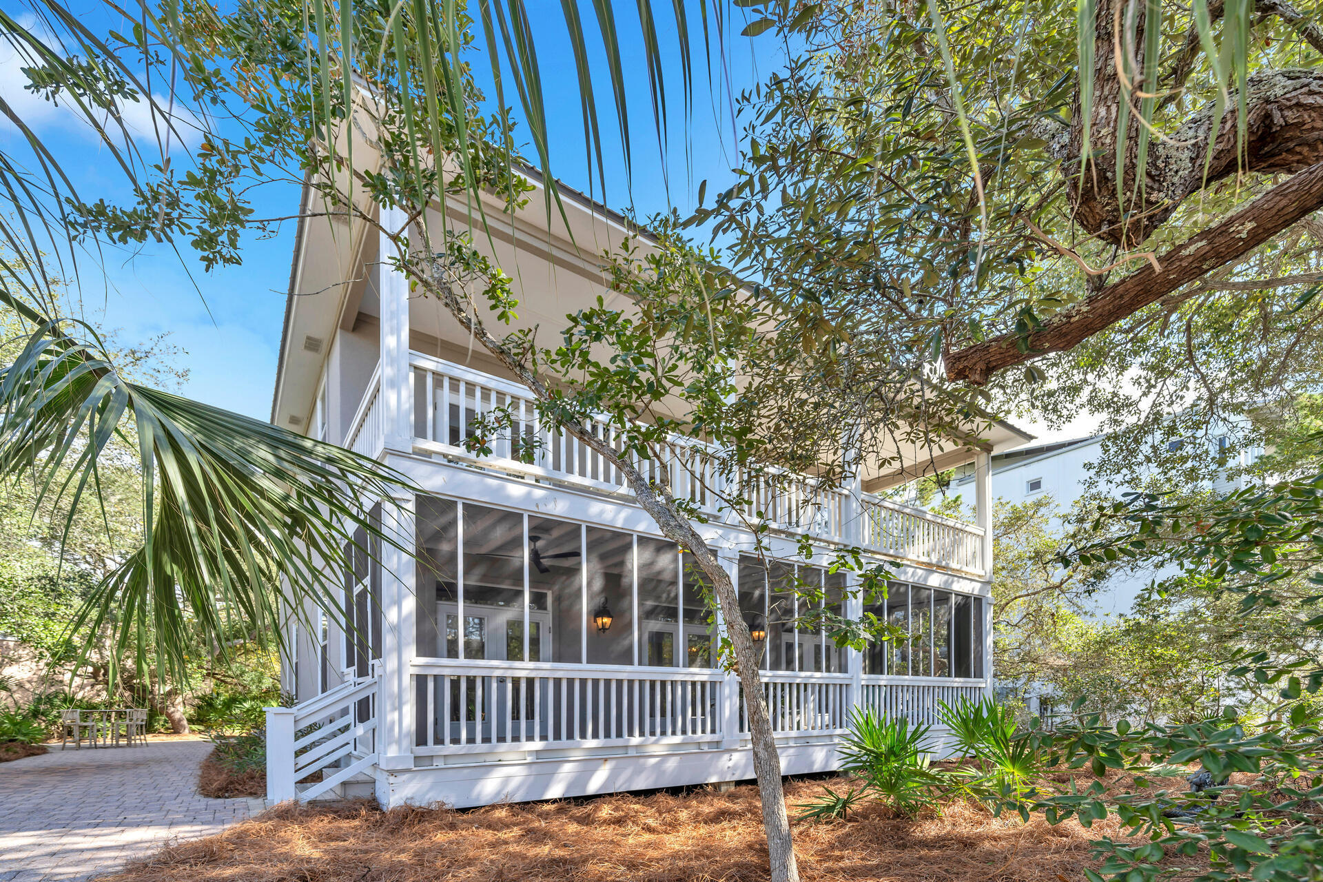 69 Lake Pointe Drive Santa Rosa Beach, FL 32459 - Photo 2 of 60 a view of a brick house with a small yard