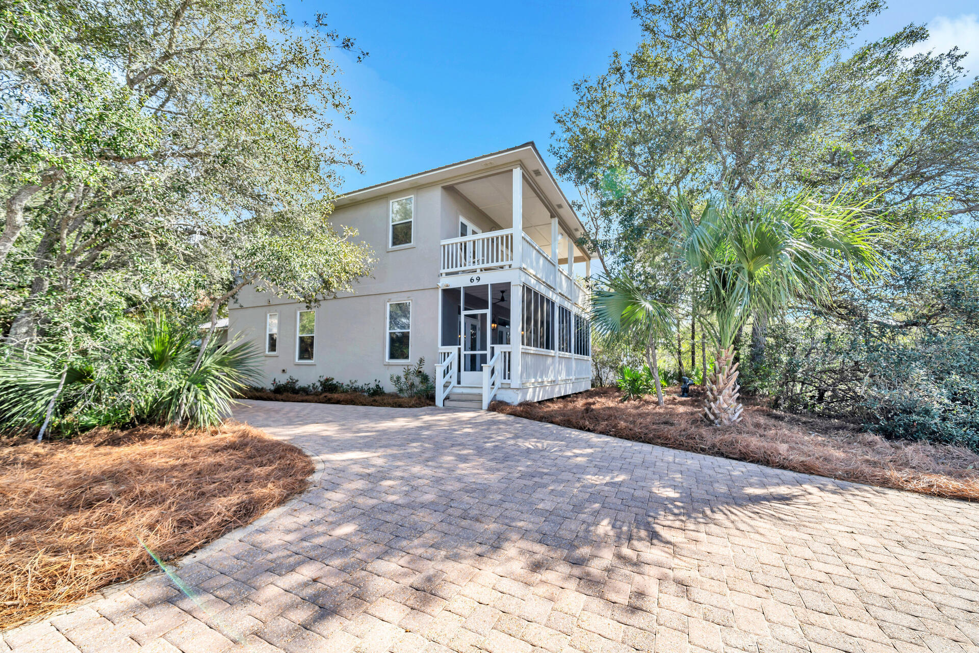 69 Lake Pointe Drive Santa Rosa Beach, FL 32459 - Photo 5 of 60 a view of a house with a yard