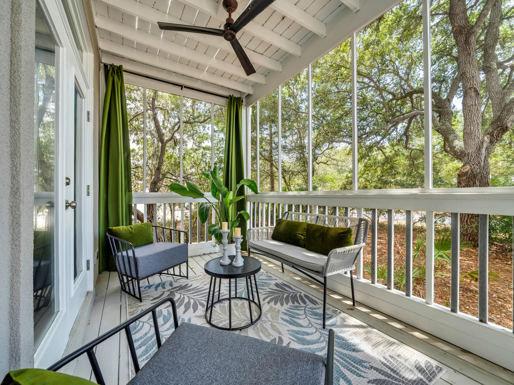 69 Lake Pointe Drive Santa Rosa Beach, FL 32459 - Photo 8 of 60 a living room with furniture and a floor to ceiling window