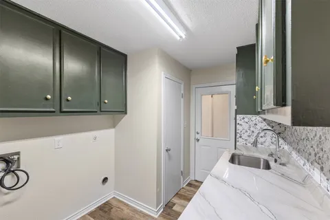 a bedroom with a large bed and a mirror