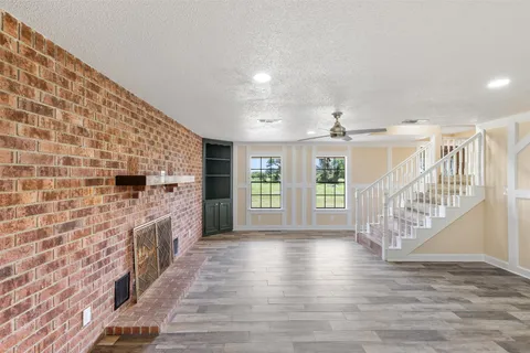 a view of entryway with wooden floor