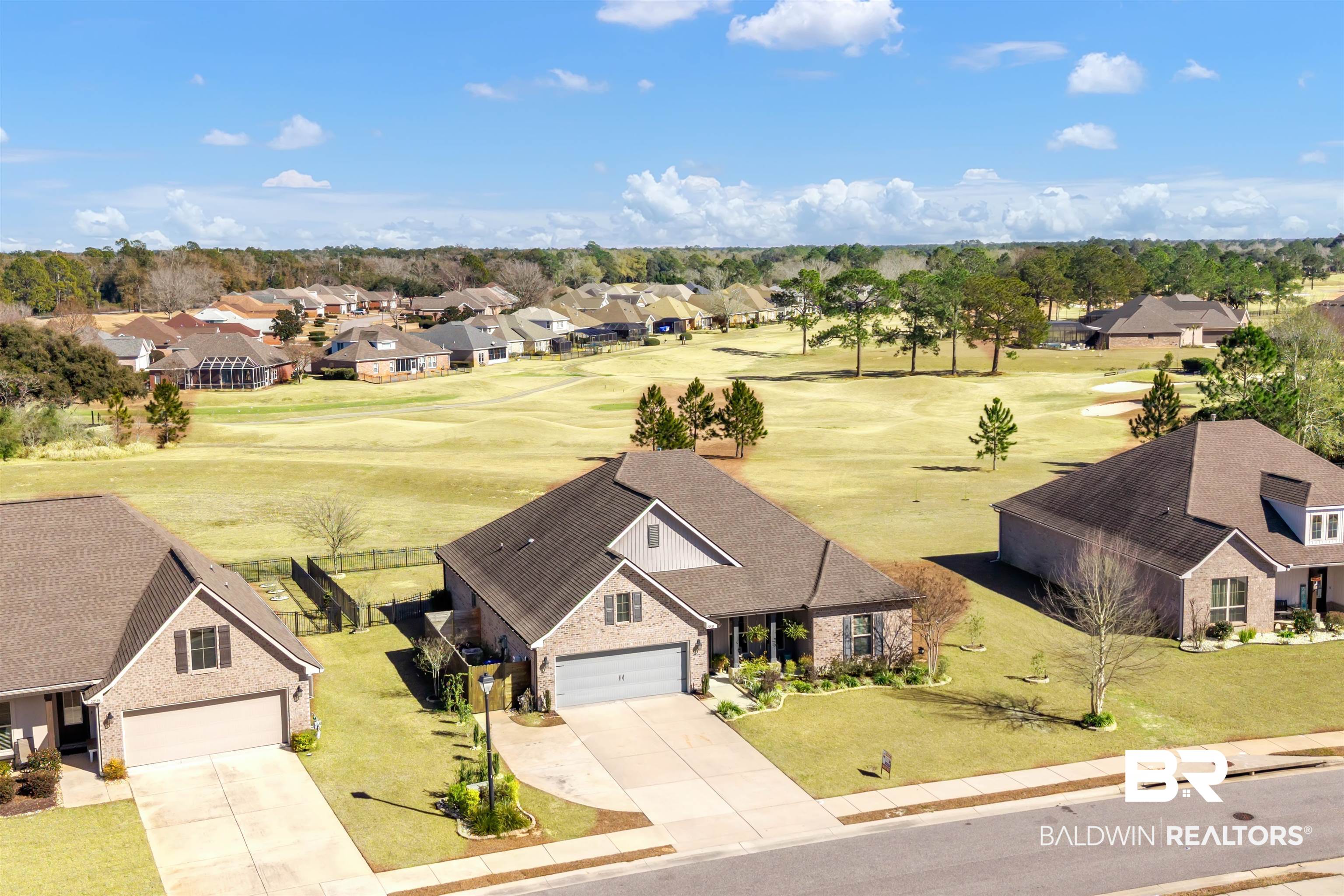 22531 Putter Lane Foley, AL 36535 - Photo 39 of 43 Aerial view of residential area featuring a golf club
