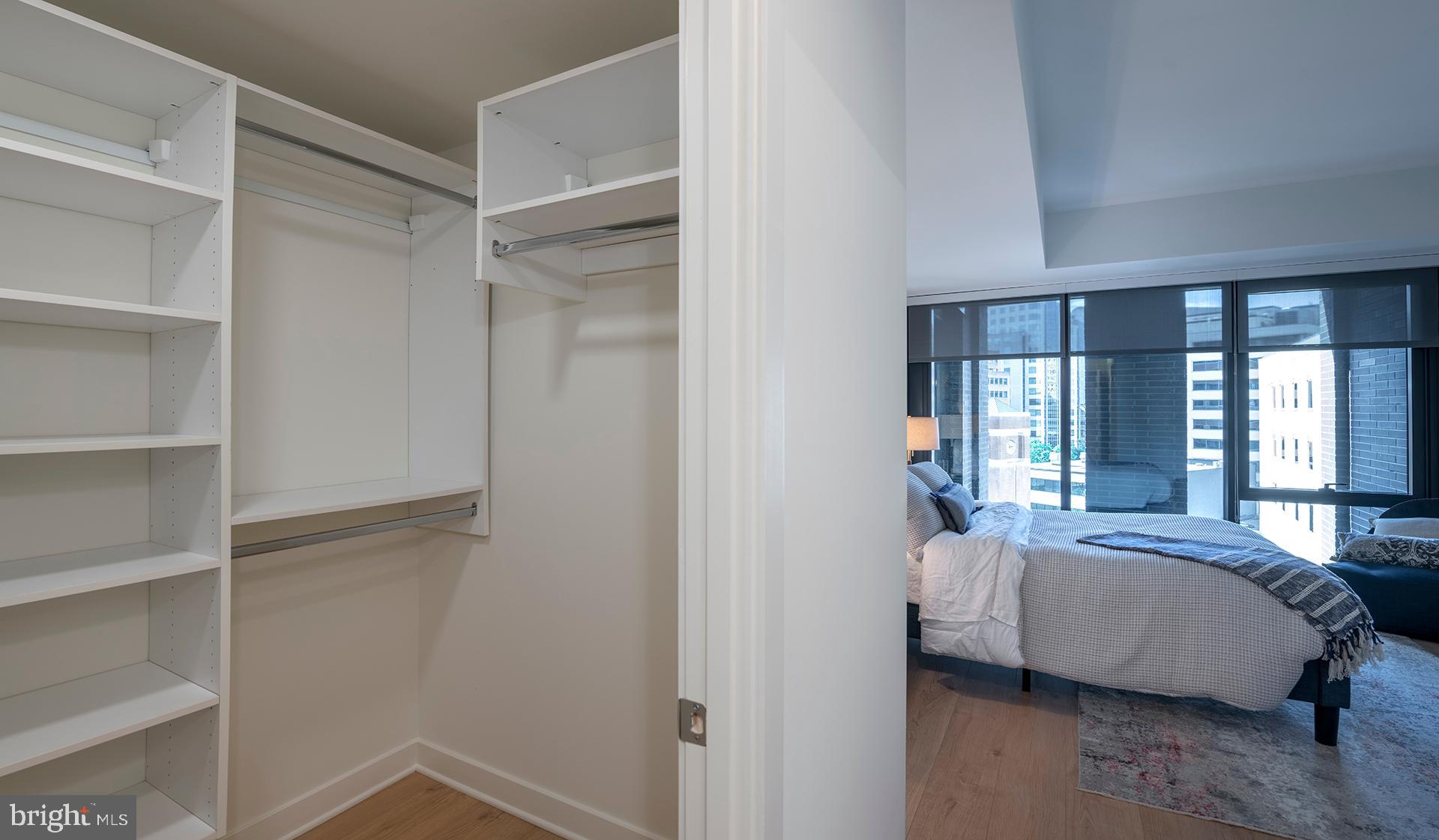 4710 Elm Street, Unit 2BE1407 Bethesda, MD 20814 - Photo 16 of 91 a bedroom with a bed and a window