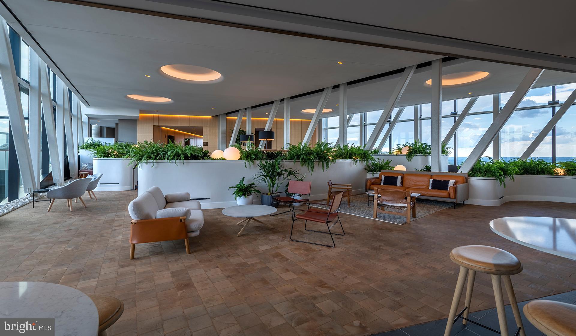 4710 Elm Street, Unit 2BE1407 Bethesda, MD 20814 - Photo 74 of 91 a living room with furniture and a large window