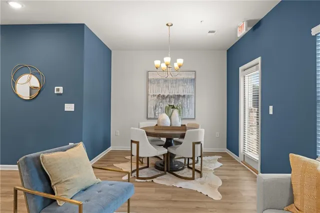 a workspace with furniture window and wooden floor