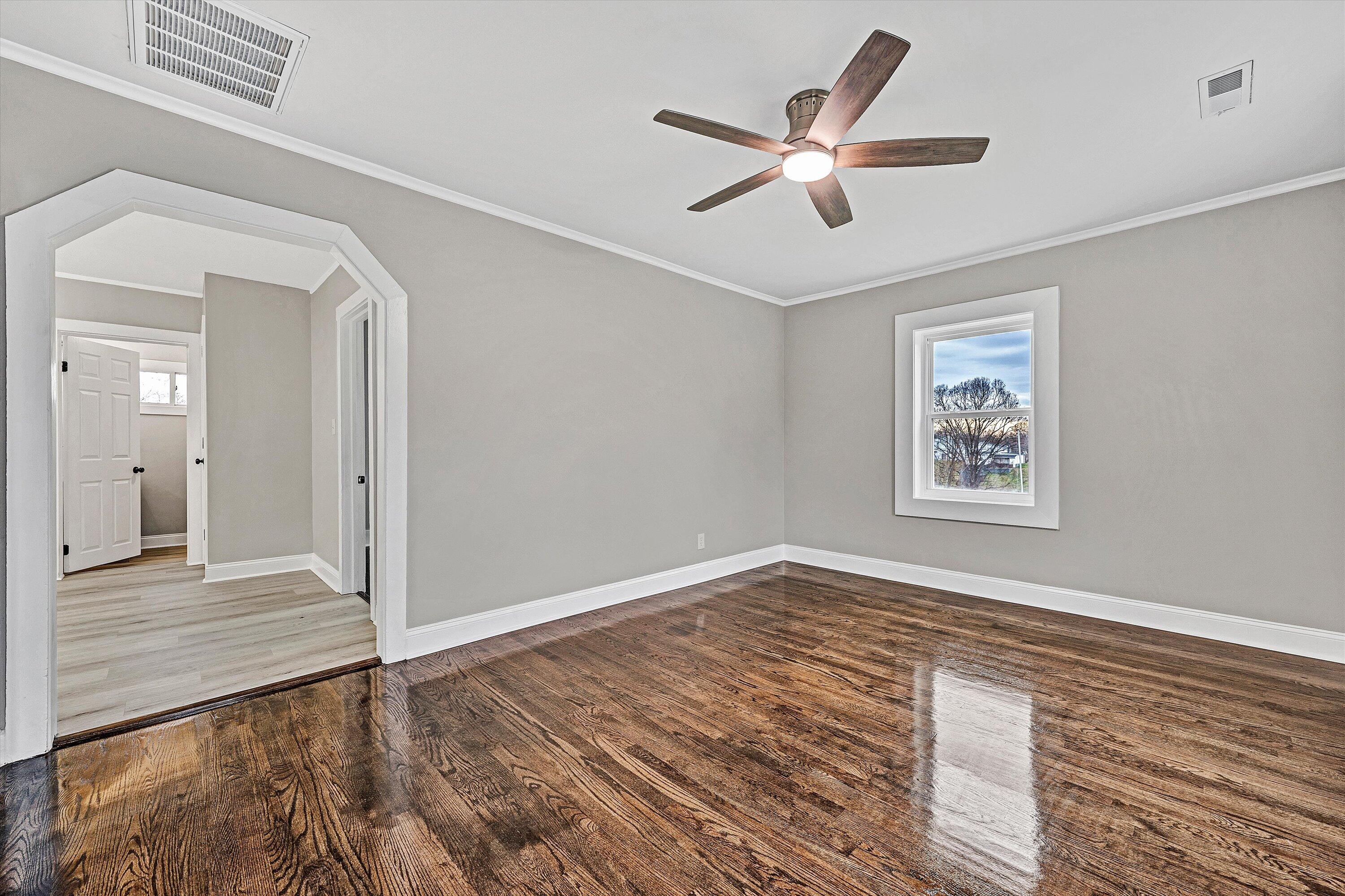 809 Ward Street Northwest Roanoke, VA 24017 - Photo 2 of 15 a view of a hallway with wooden floor