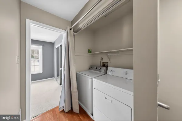 a bathroom with a sink a toilet and vanity