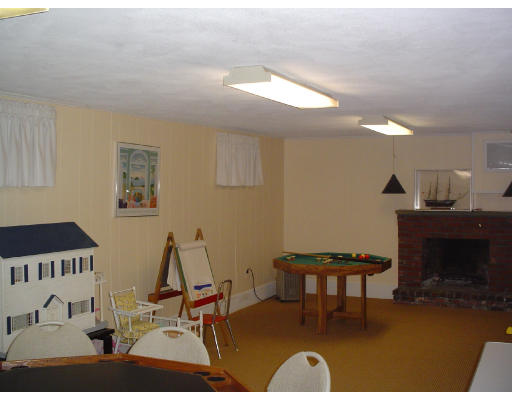 122 Kendall Road Lexington, MA 02421 - Photo 13 of 15 a living room with furniture a piano and a window
