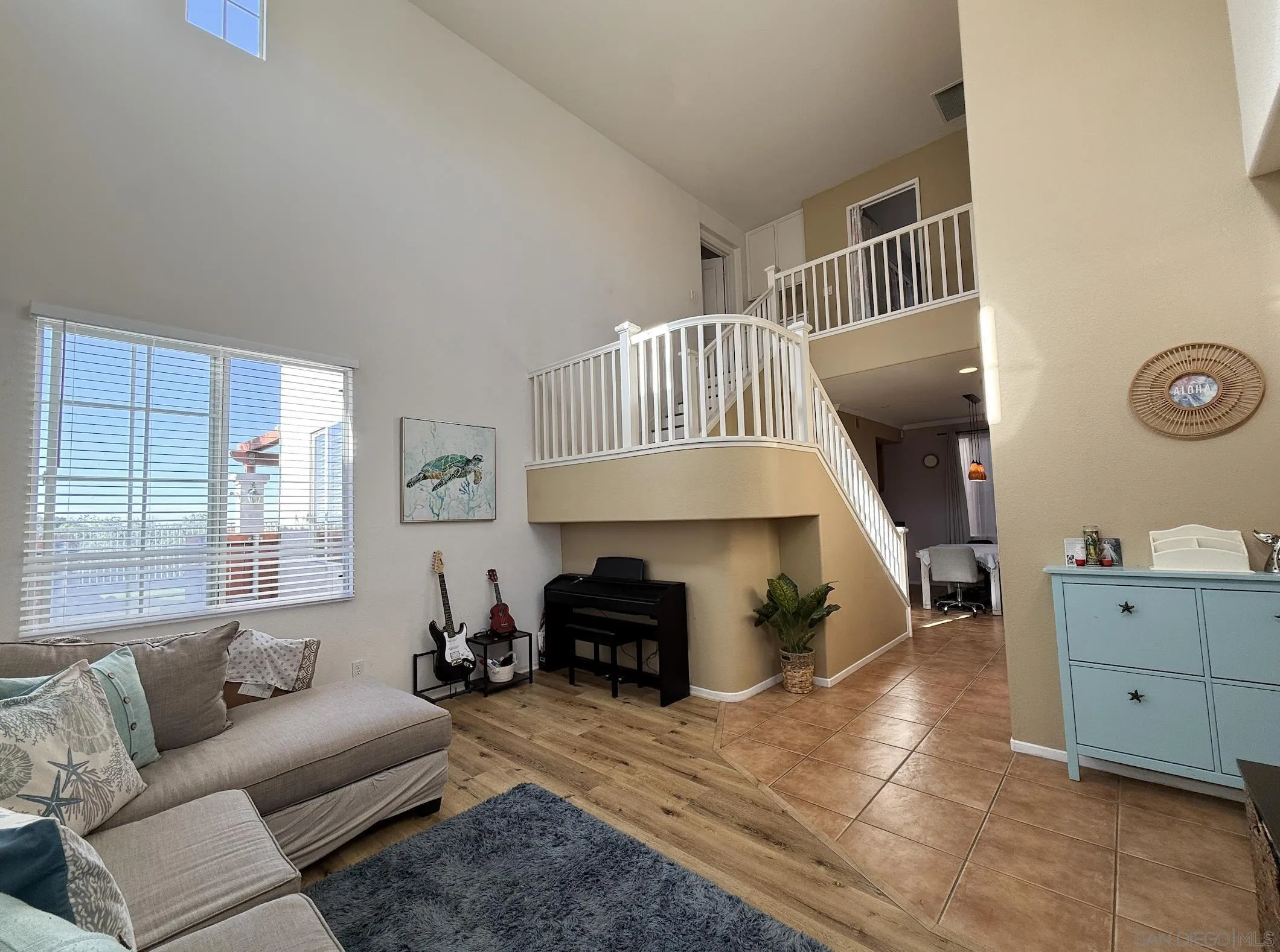 700 Rocking Horse Drive Chula Vista, CA 91914 - Photo 11 of 25 a living room with furniture and a fireplace