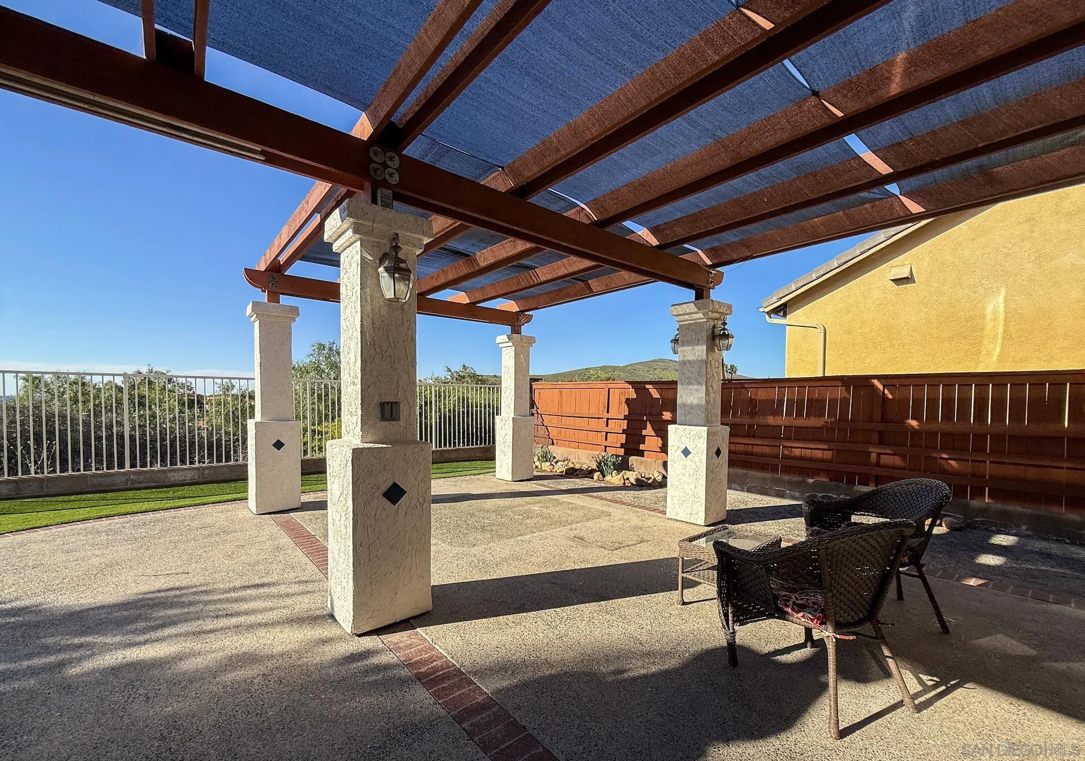700 Rocking Horse Drive Chula Vista, CA 91914 - Photo 22 of 25 a view of a chairs and table in the balcony
